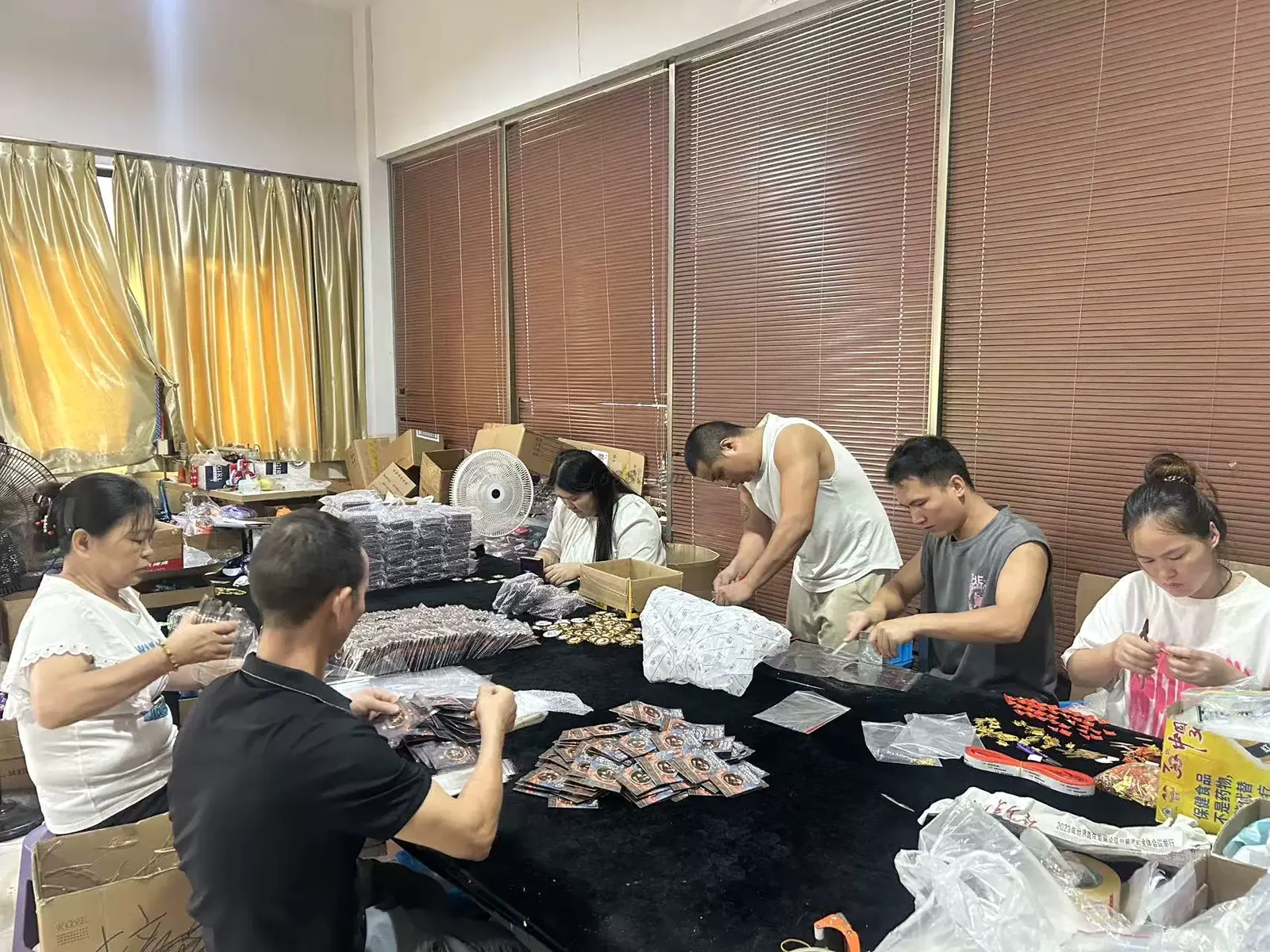 Extra Dream team inspecting and packing custom metal products